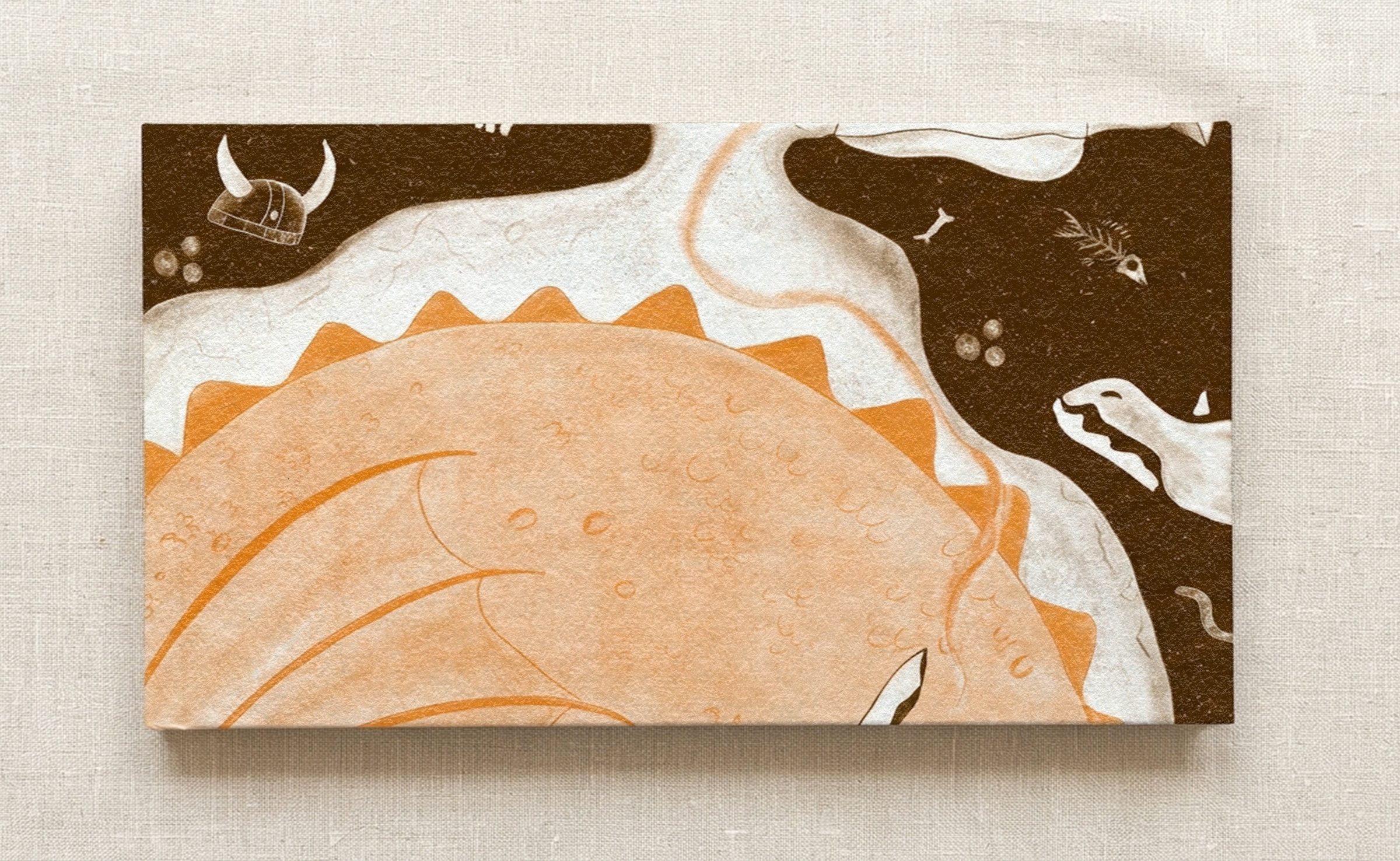 The closed book: back cover with a sleeping orange dragon, a Viking helmet and bones